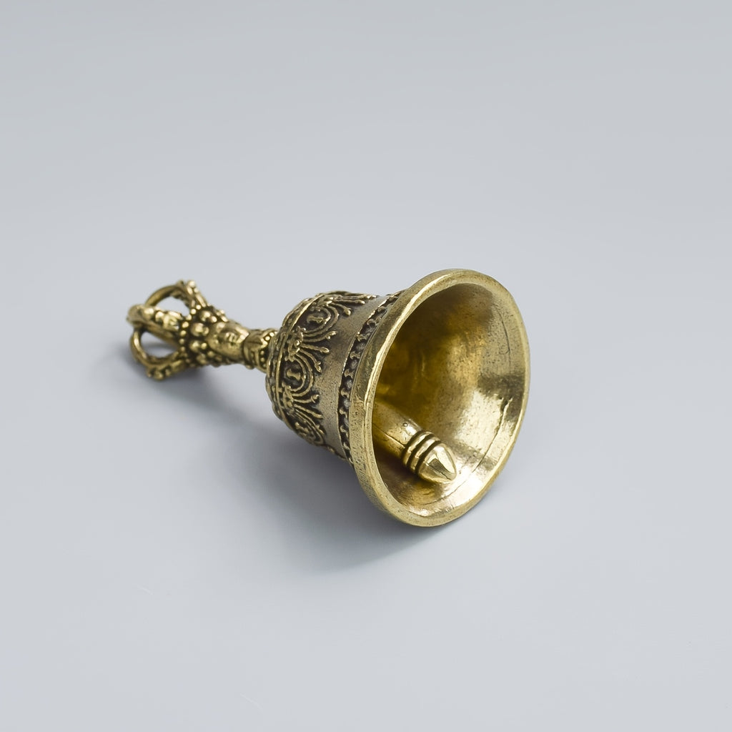 one carved bronze bell hand held shaker clapping handle