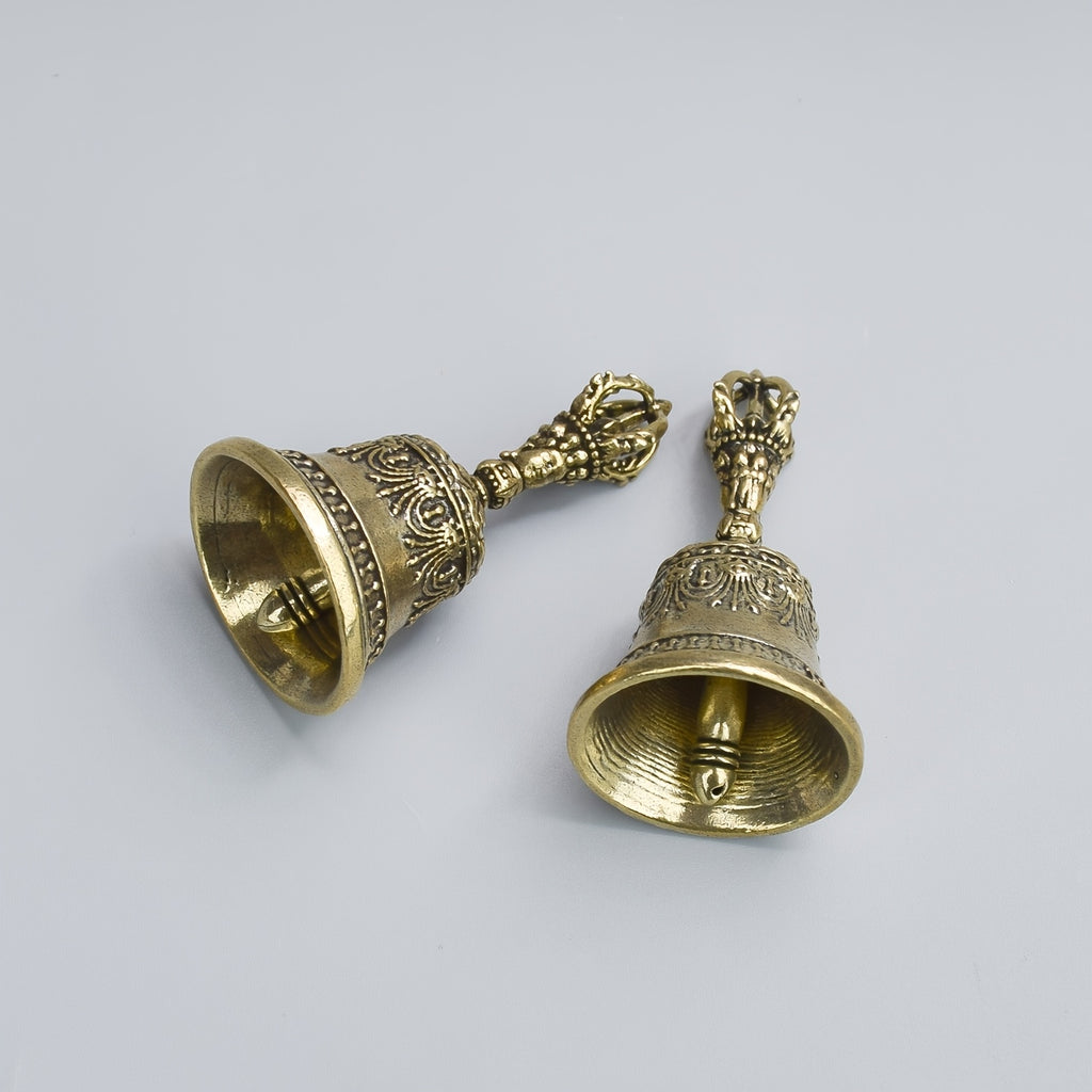 one carved bronze bell hand held shaker clapping handle