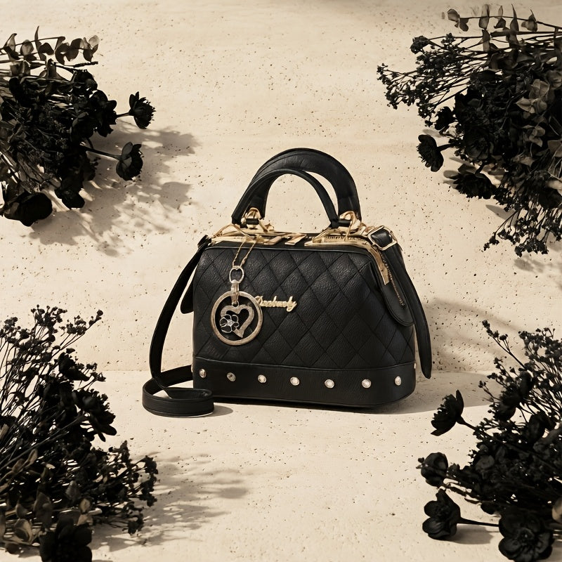 black quilted boston bag   adjustable shoulder
